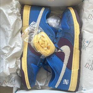 Nike Blue and Purple Sneakers with Sporty Design